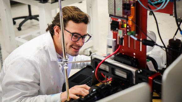 laboratory technician working with inkjet dropwatcher
